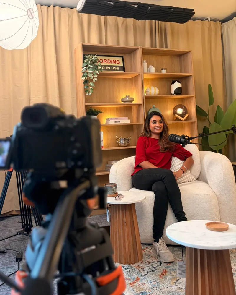 Dr Divpreet Sacha recording a podcast interview
